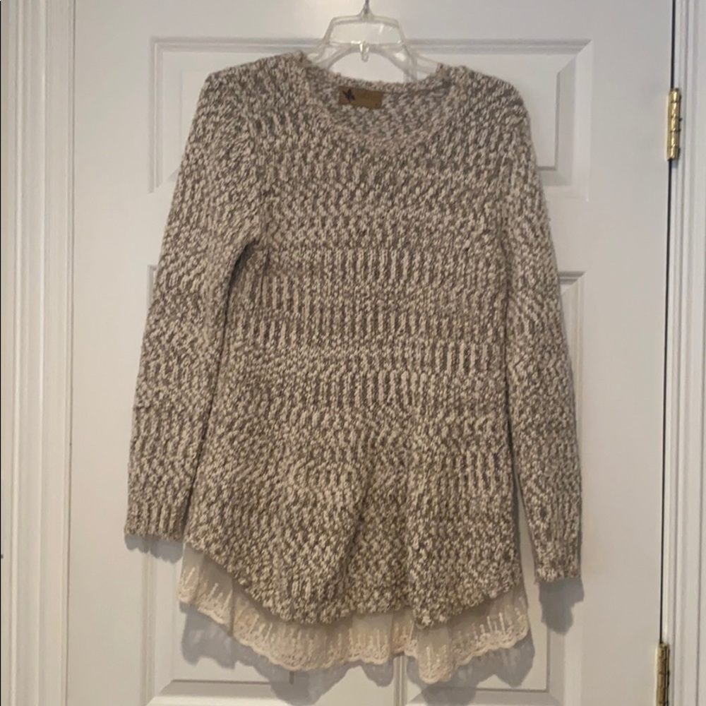 Beautiful knit sweater with lace trim bottom